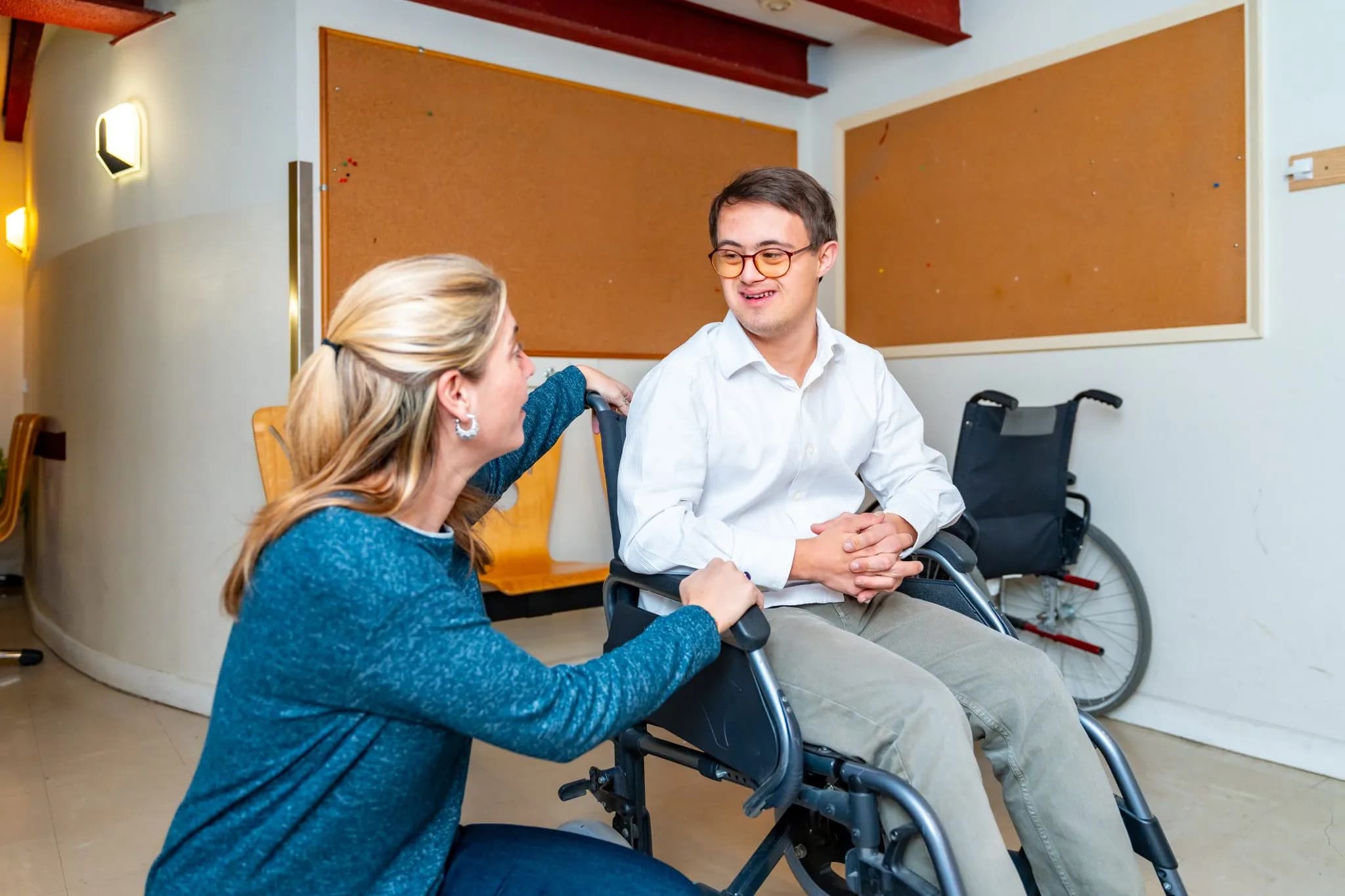 Support worker with a participant at home