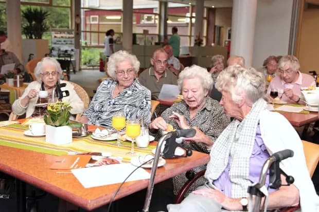 Residents sharing a meal