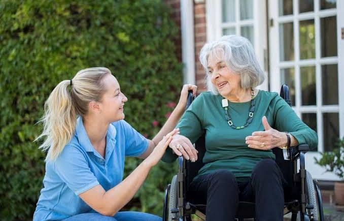 Support worker and participant out in the community